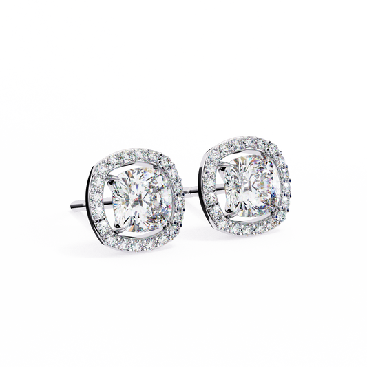 Front view of cushion cut diamond halo stud earrings in 14K white gold by Kalptaru Gems.