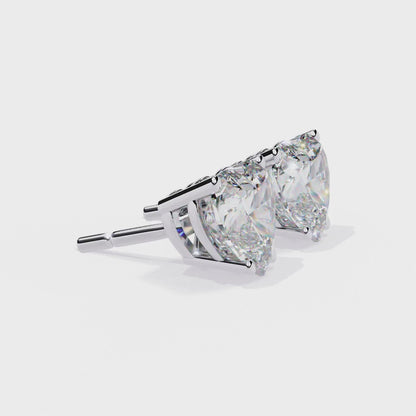 Side profile of heart-shaped diamond stud earring in white gold - kalptarugems.com